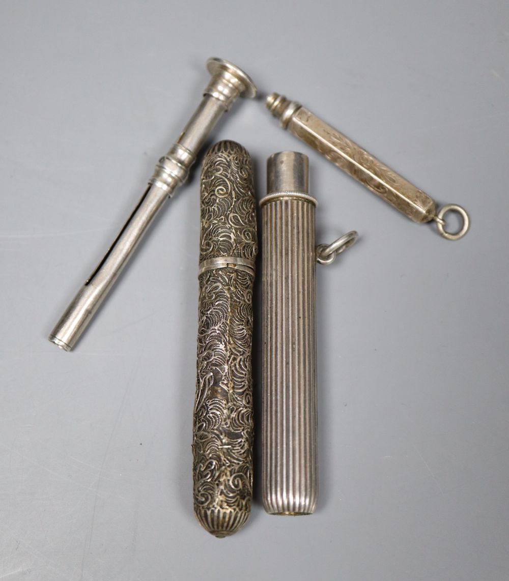 A German 935 white metal fluted pencil, 77mm, two white metal propelling pencils and a white metal filligree case(a.f.)